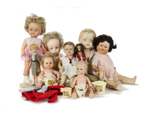 A group of dolls: including a large Effanbee shoulder head doll; a Dean’s composition headed doll; and others (generally worn