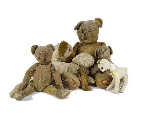 A good German 1920s Teddy Bear, with golden mohair, brown and black glass eyes, pronounced muzzle, cupped ears, swivel head, 