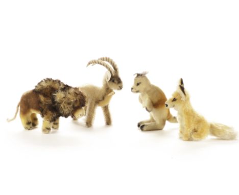 Steiff post - war Wild Animals: a Bison with script button and yellow cloth tag - 6in. (15cm.) long (tail replaced); a Kangar