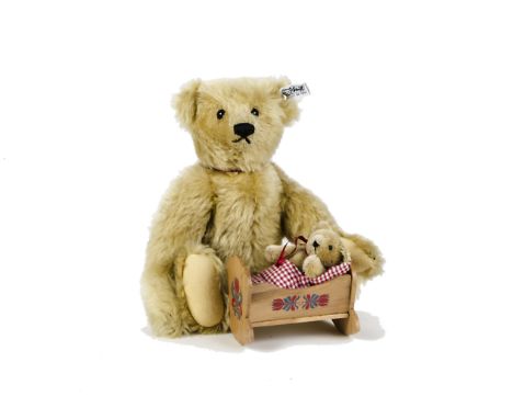 A Steiff Limited Edition Giengen Teddy Bear Set, 1080 of 16000, with baby in cradle, in original box, 1984-87 (missing box li