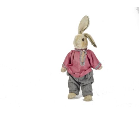 A rare Steiff Rabbit Doll, 1930s, with beige mohair head, hands and feet, brown and black glass eyes, pink stitched nose and 