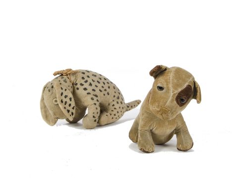 A rare Farnell velvet seated dog, 1920s, with clear and black glass eyes with brown painted backs, velvet eye lid, white velv