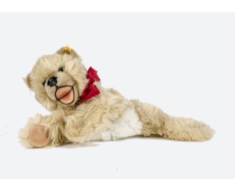 A Steiff Mimic Bear hand puppet, 1983-87, with button and yellow tag - 17½in. (44.5cm.) high