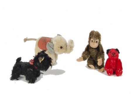 A Schuco Noah’s Ark Scottie dog, 1950s, with black mohair - 2¾in. (7cm.) long; a Steiff miniature monkey and elephant; and a 