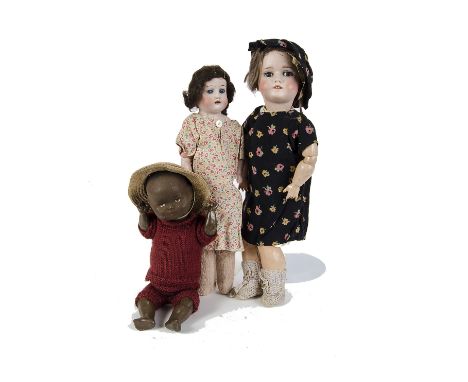 A Limbach child doll, with blue sleeping eyes, brown mohair wig, jointed composition body and black floral print dress - 15in