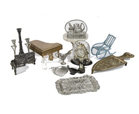 Metal dolls’ house accessories: a pair of Art Nouveau candlesticks; a cruet stand (missing bottle), a marble topped circular 