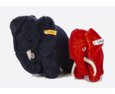 A Steiff dark blue mohair mammoth door stop, with yellow tag, in a Steiff box - 8in. (20.5cm.) high; and a limited edition El