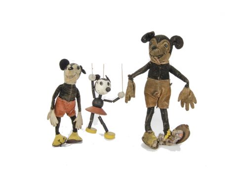 A Dean’s Rag Book Co. Mickey Mouse, circa 1928, with printed features, boot button eyes, black velvet body, red velvet shorts