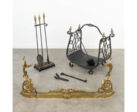 A collection of accessories for a fireplace, made of bronze and cast iron. (36 x 56 x 60cm)