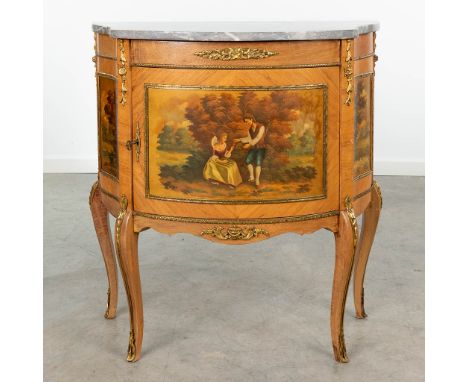 A commode with romantic decor and mounted with bronze and marble in Louis XVI style. The second half of the 20th century. (36