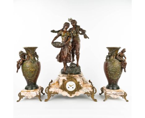 Franois MOREAU (1858-1931) 'La Pche' A three-piece mantle garniture clock and side pieces, made of spelter mounted on marble.