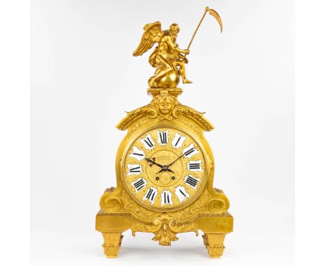 A large mantle clock 'Father Time' made of gilt bronze in Louis XVI style. Clock with half-hour strike, the second half of th