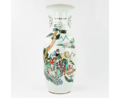 A Chinese vase made of porcelain and decorated with wise men in the garden. 19th/20th century. (59 x 23 cm)