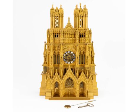 Cathedrale de Reims, an exceptional mantle clock in the shape of TheÊCathedral of Reims, France. Made of gilt bronze, with a 