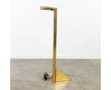 A low reading lamp, gold-plated metal. Circa 1980. (30 x 50 x 105cm)