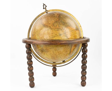 A globe 'Globe Terrestere' and edited byÊA.N. Lebgue & Cie, Brussels, Belgium. Mounted in a wood stand, circa 1900. (52 x 43c