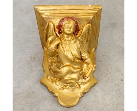 A wall console used as a stand for a statue, decorated with an angel figurine and made of gold-plated plaster. (38 x 41 x 46c