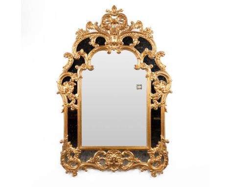 A vintage mirror, Italian style with fumŽ mirror glass. Probably made by Deknudt in Belgium. Gold-plated, circa1974. (98 x 14