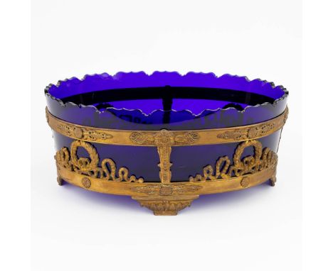 An antique Jardinire or Planter made of blue glass and gilt bronze in empire style. The first half of the 19th century. Condi