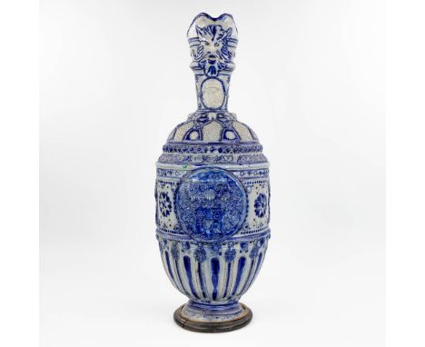 An antique, large and German Westerwald pitcher, made of glazed grs. 18th/19th century. (82,5 x 32cm)