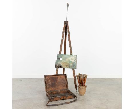 A painter's easel, brush pot and pallette. Circa 1920. (114cm)