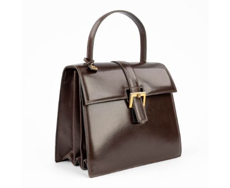 Delvaux, a handbag made of brown leather and marked. Mounted with gold-plated elements, made circaÊ1950. (8 x 23 x 30cm)