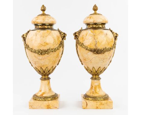 A pair of cassolettes made of yellow marble mounted with gilt bronze. (15 x 17 x 41cm)