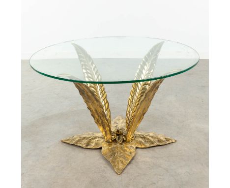 A coffee table made of bronze and glass, Hollywood Regency style and in the style of Willy Daro. The 1980s.  (45 x 75cm)