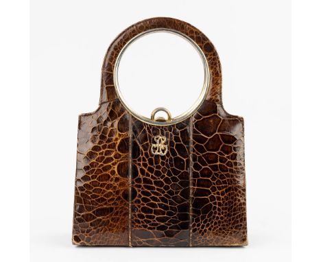 A mid-century 'Sac Tortue' handbag made of tortoise/turtleÊleather. CircaÊ1950s. (23,5 x 31,5cm)