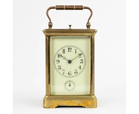 A vintage officers alarmÊclock, made of bronze glass and enamel. The first half of the 20th century. (8 x 9,5 x 17,5cm)