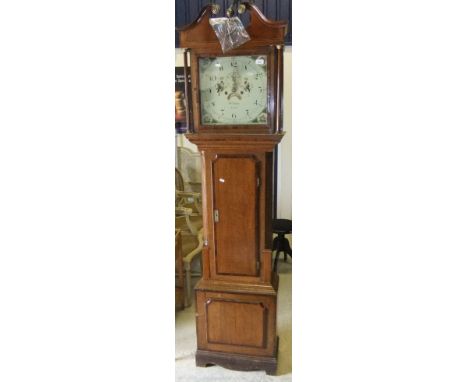 A 19th Century oak and cross banded cased longcase clock, the eight day movement by William Travis of Leek (1828-1860), with 