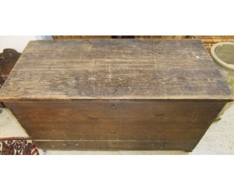 A large stained pine trunk