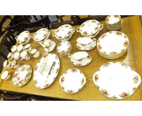 A large collection of Royal Albert "Old Country Roses" pattern dinner and tea wares to include  four lidded tureens, cake pla