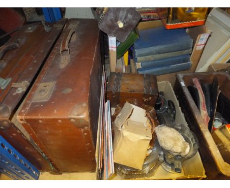 A large collection of sundry items to include leather suitcases, glass cake stand, jugs, assorted pictures, books, records, a