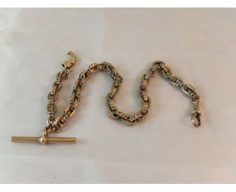 A 9 carat gold pocket watch chain of fancy link design and fob CONDITION REPORTS Overall with wear and scuffs and some knocks