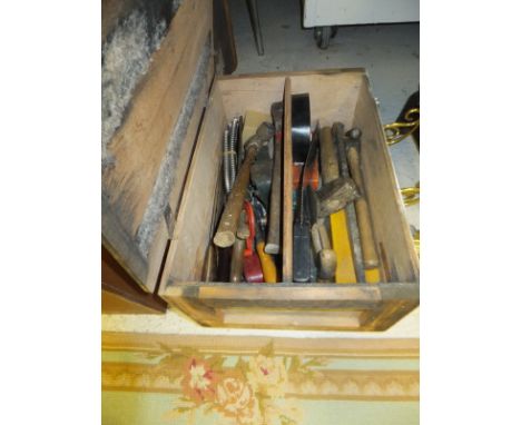 A leather covered suitcase, together with a canvas and wood bound trunk, a Corona manual typewriter, a wooden box containing 