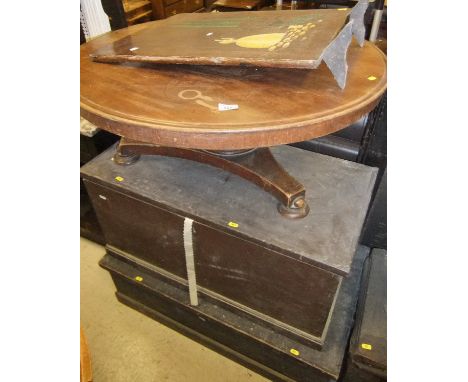 Two painted pine trunks, a mahogany low centre table, and an oak firescreen with painted decoration in the Spanish manner