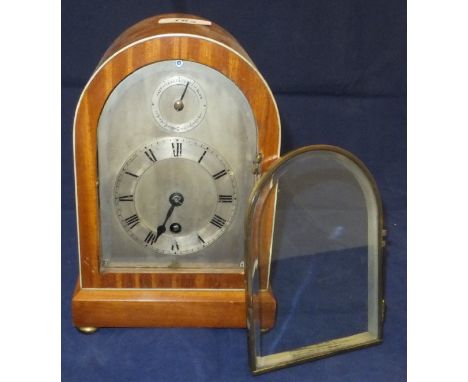 A dome cased "Coventry Astral" mantel clock with silvered dial