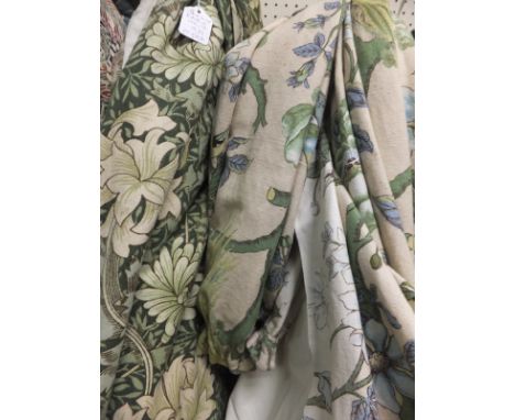 A vintage single gold and blue damask style curtain, together with a pair of cotton lined acanthus style decorated curtains