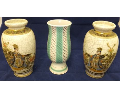 A Poole pottery vase of baluster form, raised on a conical foot, No'd. 703 to base and bearing initials "PKT", together with 
