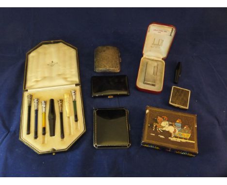 A collection of various smoking requisites to include Dunhill cigarette lighter, Asprey silver and enamel cigarette case, var