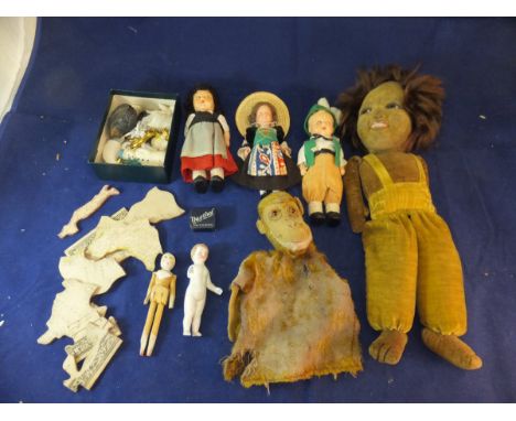 A box containing assorted toys to include a Norah Wellings type doll, monkey puppet, an "Owzthat" tin, various cake decoratio