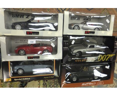 An Auto Art 007 Goldfinger model car (boxed), a Maitso Special Edition Jaguar S Type model (boxed), an Auto Art Off Road Rang