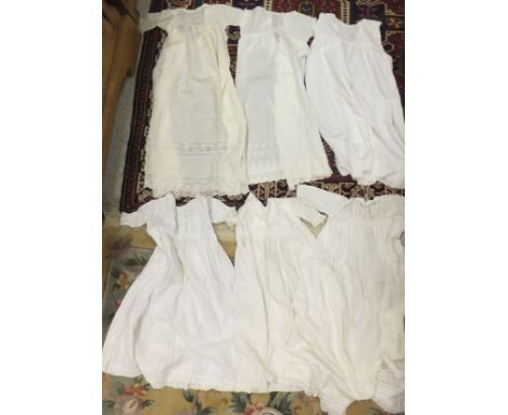 Six baby's gowns with lace / pleated detail, together with two boxes of miscellaneous items to include Zenith binoculars, cam