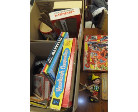 Two boxes containing a collection of vintage toys and games, to include a "Sweep" plush puppet, a Pinnochio Pelham puppet, a 