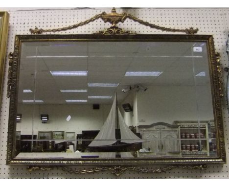 A modern gilt framed rectangular wall mirror in the Adam taste with grooved bevel edged plate CONDITION REPORTS Size approx 9