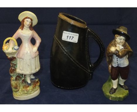 A Royal Doulton pottery leather jack, together with a Staffordshire pottery figure of a girl with basket and a Staffordshire 