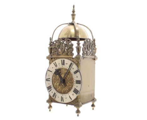 Small brass lantern clock, the Rotherhams movement with platform escapement, the 4.5" silvered dial enclosing a foliate engra