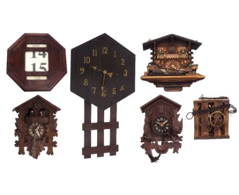 Arts &amp; Crafts oak wall clock, with brass applied Arabic numerals, within an hexagonal surround over a gate drop, 52" high