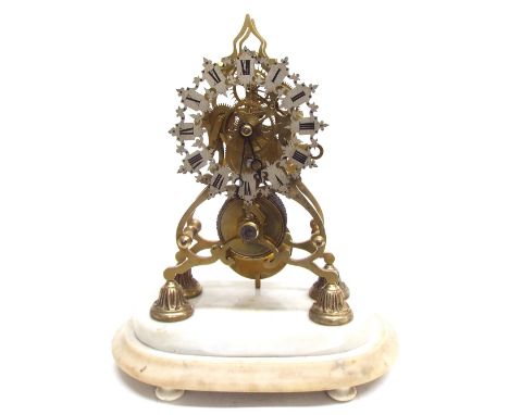 Brass single fusee skeleton mantel clock, the 5.5" pierced silvered chapter ring upon rounded supports terminating in circula